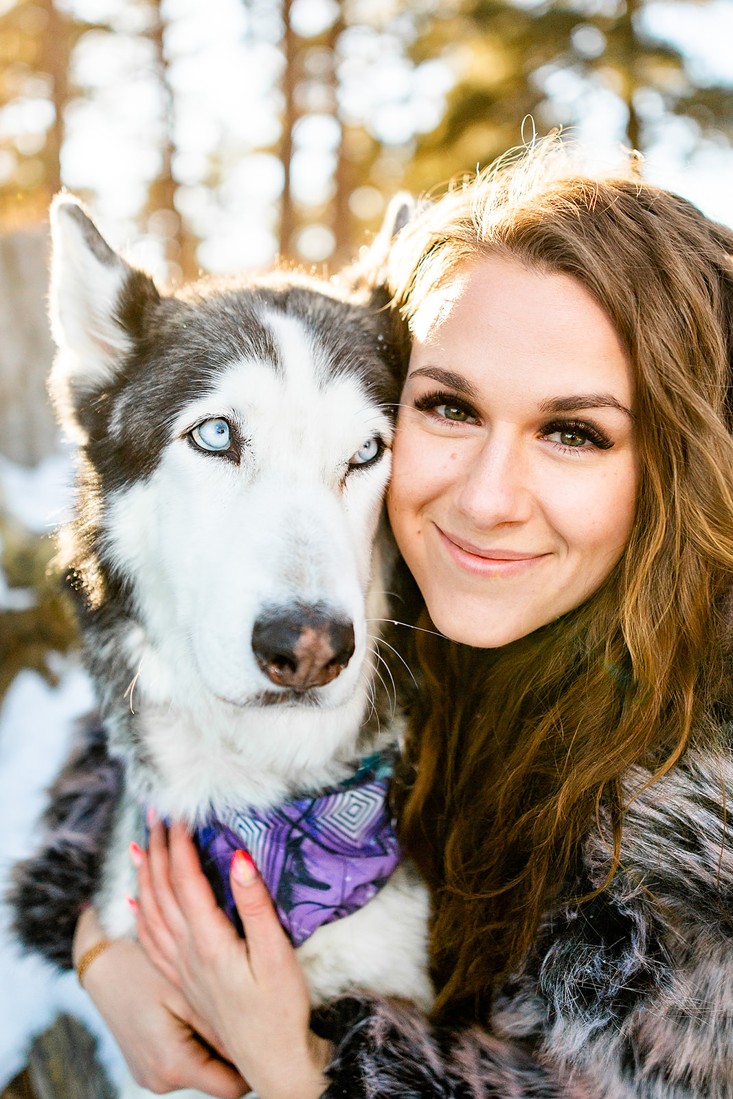Engagement photo with husky dog in the mountains near Denver